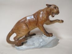 A BESWICK 1702 GLOSS FINISH PUMA ON A ROCK FIGURE