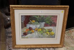 GILT FRAMED AND GLAZED PASTEL PICTURE OF A TABLE TOP STILL LIFE STUDY OF FRUIT AND FERNS - 47CM X