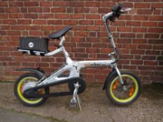 A SUBURBAN UM80 FOLD UP ELECTRIC BIKE (comes with key,no battery present,working capacity not