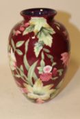 A OLD TUPTON WARE CERAMIC VASE - HEIGHT 20CM