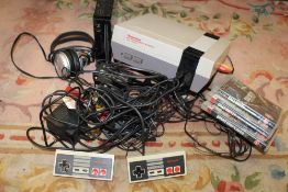 A NES NINTENDO ENTERTAINMENT SYSTEM, TOGETHER WITH A NINTENDO WII CONSOLE ETC., UNTESTED