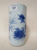 AN ORIENTAL BLUE AND WHITE SLEEVE VASE DECORATED WITH FIGURES IN THE TREES (SMALL CRACK TO RIM)