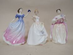 THREE ROYAL DOULTON FIGURES CONSISTING OF 'GIFT OF LOVE' HN3427, 'SWEET POETRY' HN4113 AND ELEANOR