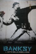 A LARGE FRAMED AND GLAZED BANKSY L'ARTE DELLA RIBELLIONE PRINT OVERALL SIZE INCLUDING FRAME -