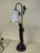 A MODERN RESIN FIGURAL TABLE LAMP WITH GLASS SHADE, OVERALL H 68 CM