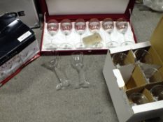 A BOXED SET OF SIX ITALIAN WINE GLASSES, A BOXED SET OF SIX DARTINGTON GLASSES AND A BOXED SET OF