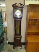 A MODERN MAHOGANY GRANDMOTHER CLOCK WITH TWO WEIGHTS AND PENDULUM