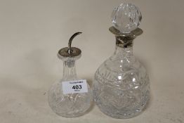 A SMALLER HALLMARKED SILVER RIMMED CUT GLASS DECANTER OVERALL HEIGHT INCLUDING STOPPER -17.5CM,
