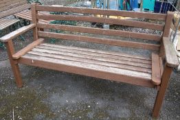 A WOODEN GARDEN BENCH- AS FOUND L 166 CM