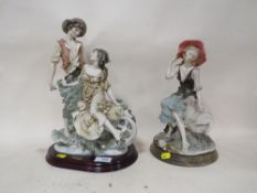 A CAPO DI MONTE GUISEPPE ARMANI FIGURE OF A MAN WITH A WOMAN IN A WHEELBARROW, TOGETHER WITH A