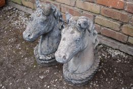 TWO HORSE HEAD GARDEN ORNAMENTS