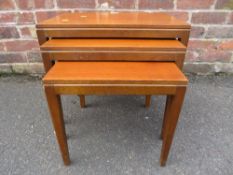 A RETRO NEST OF THREE TABLES - LARGEST W 53 CM