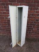 A HEAVY DUTY STEEL GUN CABINET PAINTED WHITE