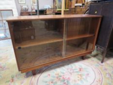 A VINTAGE TEAK GLAZED BOOKCASE - W 84 CM