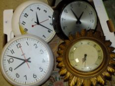 FOUR VINTAGE WALL CLOCKS TO INCLUDE A SUN BURST STYLE EXAMPLE