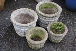 FOUR MATCHING PLANT POTS LARGEST H-33 CM (1 WITH CONTENTS )