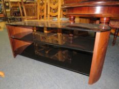 A MODERN GLASS TV STAND