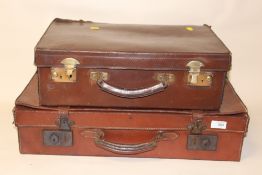 TWO VINTAGE LEATHER SUITCASES