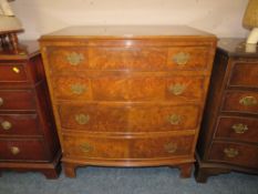 A 20TH CENTURY BOW FRONTED FOUR DRAWER CHEST H-85 W-79 CM