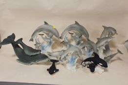 A TRAY OF HIGHBANK PORCELAIN DOLPHIN AND WHALE FIGURES ETC.