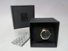 A NEW AND BOXED BIBA EMBLEM LOGO WATCH, watch Dia. approx 3.4 cm