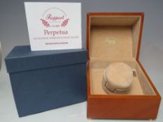 A BOX RAPPORT PERPENTUA ELECTRONIC WATCH WINDER, lacking power lead but also operates by