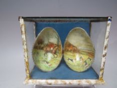 A VINTAGE CASED HAND PAINTED EGG, decorated with scenes of huntsmen and hounds, case approx 13.5