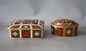 A ROYAL CROWN DERBY IMARI PATTERN RECTANGULAR LIDDED TRINKET BOX, together with a smaller Royal