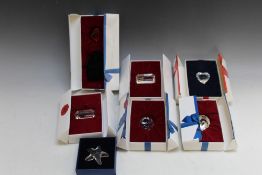 A COLLECTION OF ASSORTED SWAROVSKI CRYSTAL DECORATIONS, to include a starfish, a clear heart and a