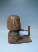 AN EARLY 20TH CENTURY WOODEN ADJUSTABLE MILLINERS HAT BLOCK STRETCHER S/D