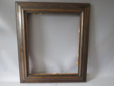 A 19TH CENTURY DUTCH DECORATIVE WOODEN FRAME, frame W 9.5 cm, rebate 48 x 57 cm
