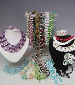 A COLLECTION OF MAINLY VINTAGE AND RETRO BEAD NECKLACES., various styles and periods comprising 40s,