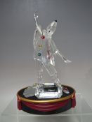 A SWAROVSKI CRYSTAL SCS 1999 MASQUERADE PIERROT FIGURE, with box, glass name plaque and stand