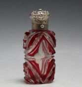 A OVERLAY GLASS SCENT BOTTLE, with push button opening chased lid, H 9 cm