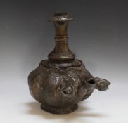 A BRONZE TYPE HOOKAH PIPE BASE WITH THREE 'SERPENT' HEADS, H 29 cm