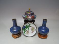 A PAIR OF MINIATURE ORIENTAL CLOISONNE VASES ON HARDWOOD STANDS, blue tonal floral design, overall H