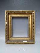 A 19TH CENTURY GOLD FRAME WITH EGG AND DART DESIGN TO OUTER EDGE, frame W 9 cm, rebate 30 x 26 cm