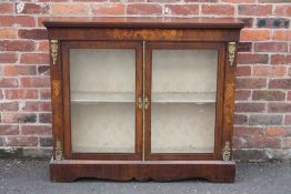 A MID VICTORIAN WALNUT AND INLAID TWO DOOR CABINET, with gilt metal mounts, H 105 m, W 123 cm, D