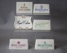 A COLLECTION OF SIX CERAMIC NAME PLAQUES, for Minton, Royal Doulton x 2, Royal Albert, Royal Osborne