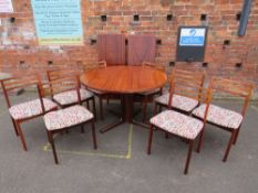 A MID 20TH CENTURY DANISH NIELS O. MOLLER FOR GUDME MOBELFABRIK CIRCULAR DINING TABLE AND EIGHT