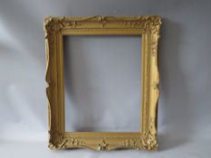 A 19TH CENTURY GOLD SWEPT FRAME WITH RESTORATION, frame W 8 cm, rebate 52 x 42 cm