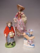 A FRANKLIN MINT V & A MUSEUM FIGURINE, depicting a lady in traditional costume reading a book, H