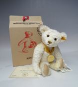 A STEIFF YEAR BEAR 'THE MILLENNIUM BEAR' 654701, button in ear with yellow tag, serial no 17509,