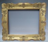 A LATE 18TH / EARLY 19TH CENTURY GOLD DECORATIVE FRAME, with corner embellishments, frame W 8 cm,