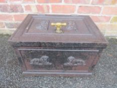 A LATE 18TH / EARLY 19TH CENTURY CAST IRON STRONG BOX, with lion panelled decorations, with key, W
