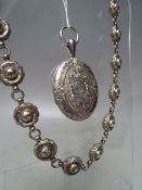 A VICTORIAN WHITE METAL LOCKET AND ASSOCIATED CHAIN, chain detached from locket, locket H 5.5 cm,