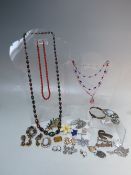 A COLLECTION OF VINTAGE COSTUME JEWELLERY, various styles and periods to include a souvenir
