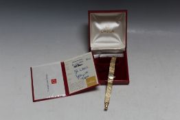 OMEGA - A LADIES HALLMARKED 9 CARAT GOLD WRIST WATCH, coming with original box and guarantee from