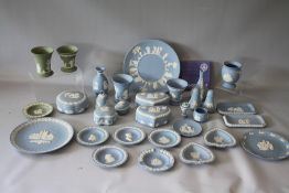 A COLLECTION OF WEDGWOOD BLUE AND WHITE JASPERWARE, comprising a selection of lidded trinket pots,