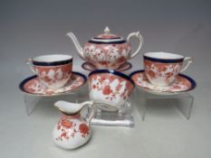 A ROYAL CROWN DERBY PORCELAIN 'TEA FOR TWO' BREAKFAST SET, comprising a teapot, jug, sugar bowl, two